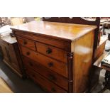 A large Victorian mahogany chest, fitted two short and three long drawers below a blind frieze