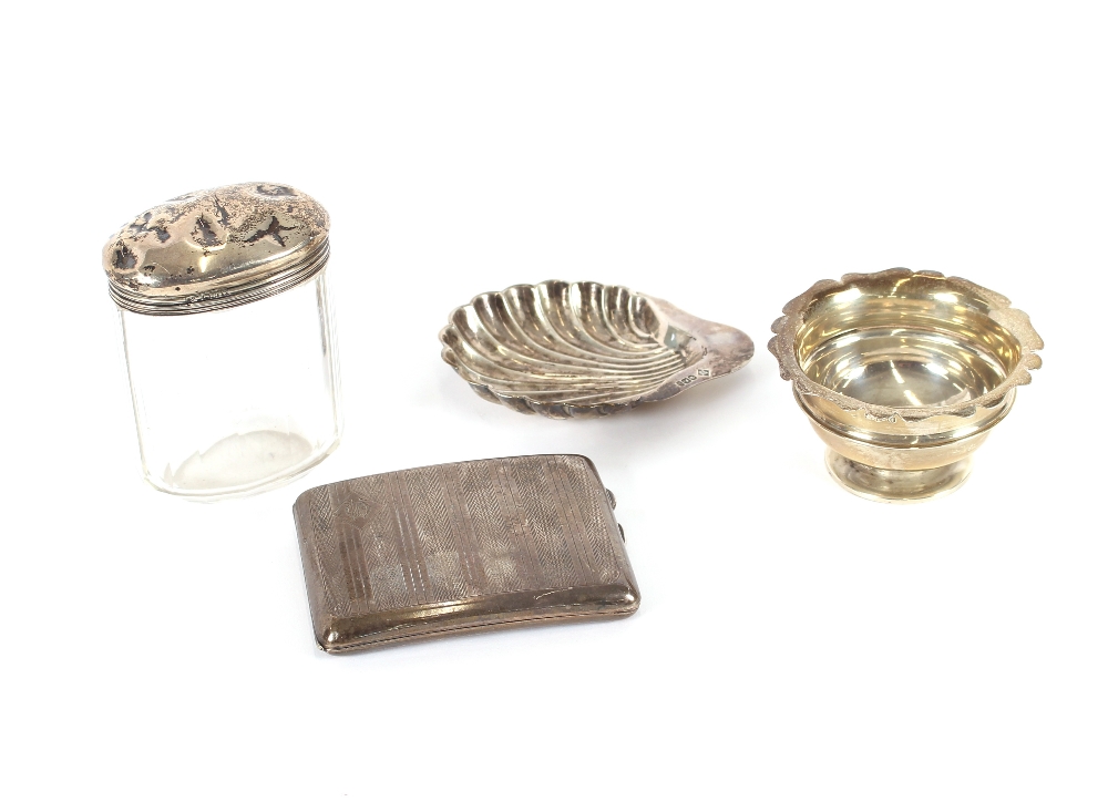 A silver shell shaped butter dish, Sheffield 1900; a small silver sugar bowl, Chester 1897; an Art