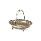 An oval plated swing handled fruit basket, with foliate raised border, pierced swing handle raised