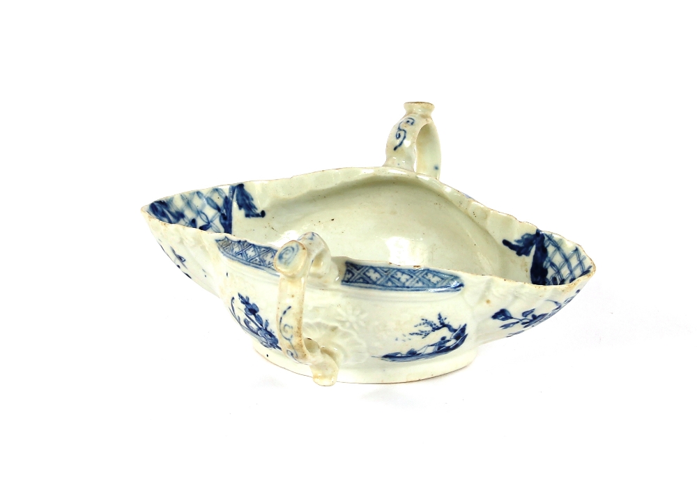 An 18th Century English porcelain double lipped sauce boat, with ring handles, decorated in the