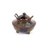 A cloisonne censer, with all over floral and symbol decoration, 10.5cm dia. overall x 9.5cm high