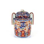 A Japanese Imari baluster vase and cover, having loop handles, decorated in the traditional palette,