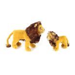 One large and one small Steiff Lion, one with button in ear, (2)