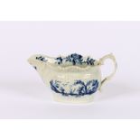 An 18th Century Worcester cream jug, decorated with foliate sprays on a moulded ground, 13cm AF