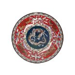 A pair of oriental cloisonne dishes, having dragon and flower decoration, 30cm dia.