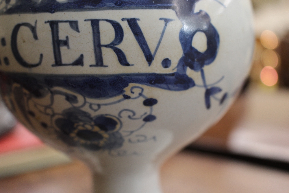 An 18th Century Delft wet drug jar, inscribed S:E.,SPIN:CERV.  having blue floral and cherub - Image 13 of 13