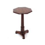 A Victorian octagonal rosewood occasional table, with inlaid chess board top, raised on octagonal