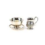 A silver sugar bowl, Birmingham 1922; a silver stand initialled JDLL; and a plated tankard, (3)