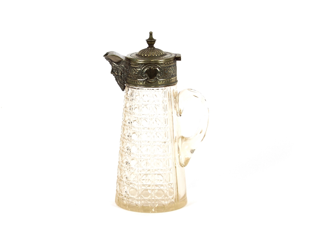 A cut glass and plate mounted claret jug, 27cm high