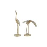 Two brass figures depicting storks