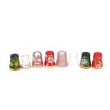 Various decorative glass thimbles, including Millefiore examples