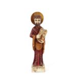 A 19th Century carved and coloured figure of a bearded Saint in the 17th Century style, with gilt