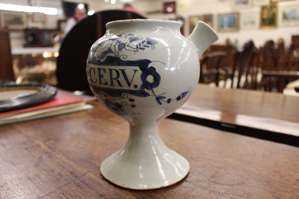 An 18th Century Delft wet drug jar, inscribed S:E.,SPIN:CERV.  having blue floral and cherub - Image 3 of 13