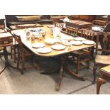 A 19th Century mahogany twin pillar dining table, having two extra leaves, AF