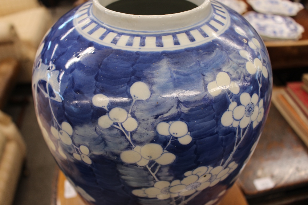 A large Chinese blue and white vase and cover, with Prunus decoration, restored, the lid  AF, 44cm - Image 8 of 8