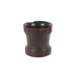 A large rustic wooden mortar, 19cm high