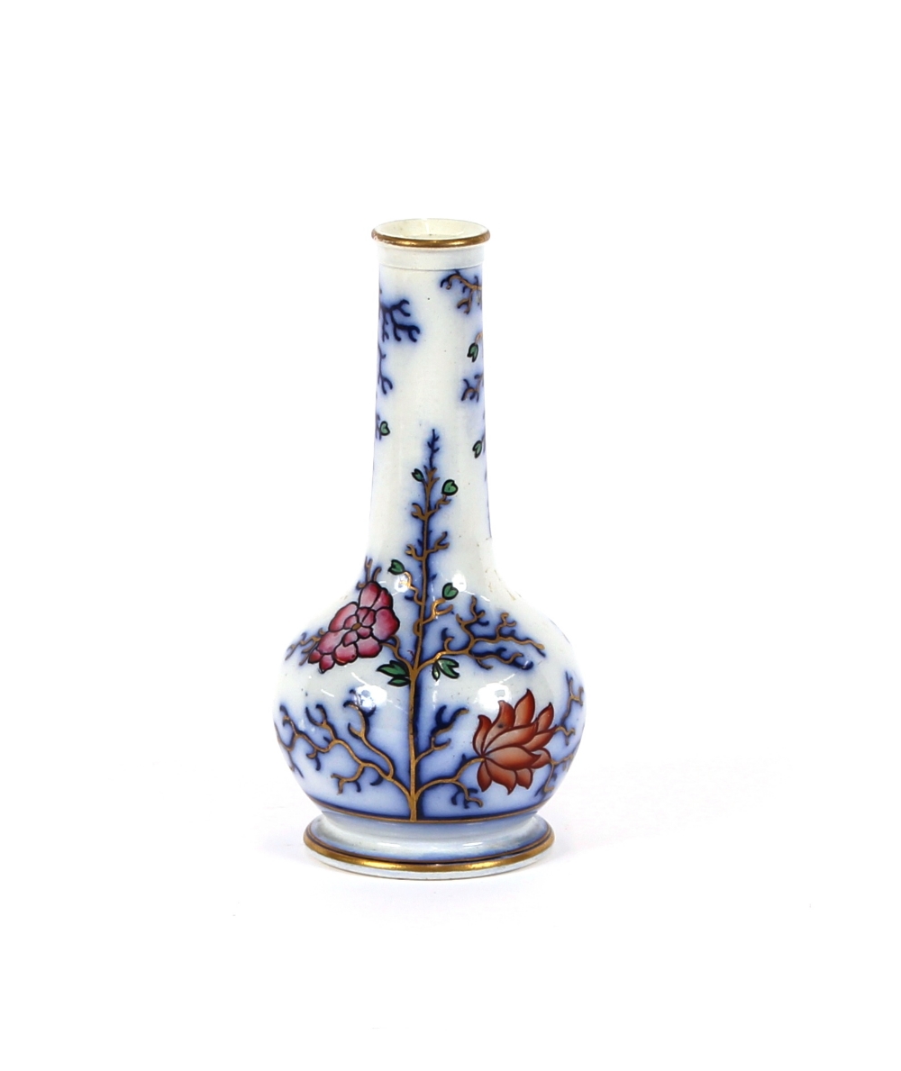 A late Victorian porcelain posy vase, decorated in the Chinese manner heightened in gilt, 18cm high