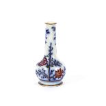 A late Victorian porcelain posy vase, decorated in the Chinese manner heightened in gilt, 18cm high