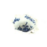 An 18th Century blue and white porcelain leaf form butter boat, of small size, 8cm long overall