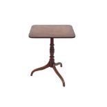 A 19th Century mahogany rectangular tilt top occasional table, raised on turned column and tripod