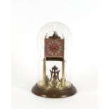 A brass Anniversary clock, under glass dome, 32cm high