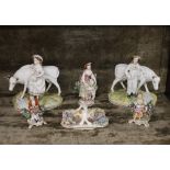 A pair of Staffordshire figure groups, depicting milk maid and cow herd; a 19th Century porcelain