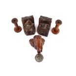 A pair of Italian carved wooden book-ends, in the form of musicians; a bell hung to a carved