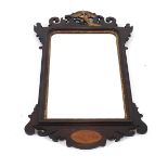 A Chippendale style mahogany fret carved wall mirror, with gilt ho ho bird decoration and inlaid