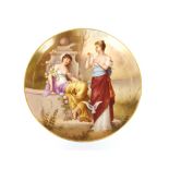 A Vienna porcelain plate, depicting young beauty's in exotic garden, inscribed verso "Blumenorakel",