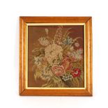 A 19th Century needlepoint embroidery, in birds eye maple frame