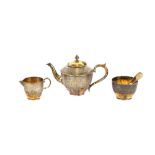 A Victorian silver gilt bachelor's tea set, having finely engraved foliate decoration; together with