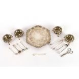 Various silver and silver plated condiment spoons; four plated salts and a small plated salver etc.