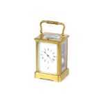 A brass cased French striking carriage clock, with repeat button, white enamelled Roman numeral dial