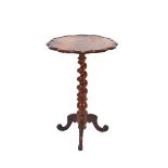 A Victorian rosewood occasional table, the shaped border top on spiral twist column and tripod base,