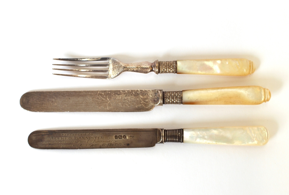 Six Victorian mother of pearl handled fruit knives, and five forks; and a silver bladed fruit