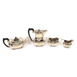A silver four piece tea set, of baluster form, having gadroon borders, raised on ball feet,