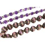 An amethyst and white metal necklace; and a fine enamelled bead necklace