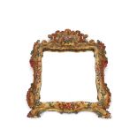 An 18th Century Florentine carved gilt wood and foliate painted wall mirror, 64cm x 46cm overall