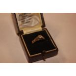 A 9ct gold diamond set ring