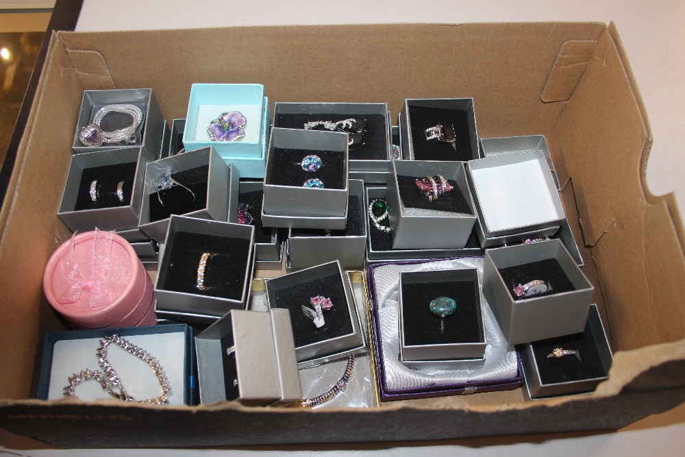 A box of various dress rings