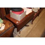 A 19th Century mahogany drop leaf supper table