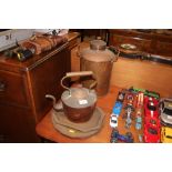 A copper kettle together with various brass trays