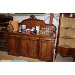 A Victorian mahogany pedestal sideboard fitted wit