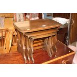 A nest of three Ercol occasional tables