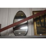 A retro style oval mirror