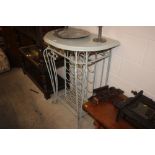 A painted wooden and wrought iron side table with