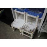 Two white painted child's chairs