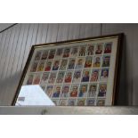 A framed collection of cigarette cards