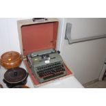 An Olympia typewriter in fitted case