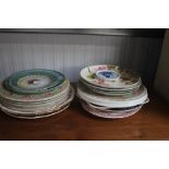 A quantity of decorative plates